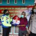 Polisi Berikan Bansos 50 Paket Sembako Ke Dusun Sukaharja Ditengah PPKM