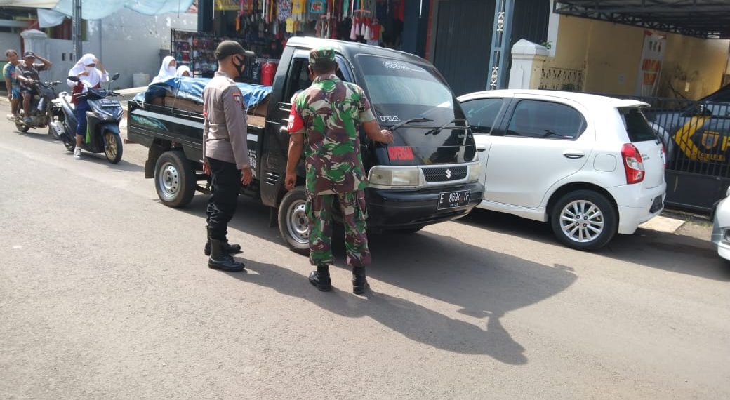 Anggota Polsek Lelea Gelar Pendisiplinan Dan Penindakan Prokes Giat Ops Non Yustisi