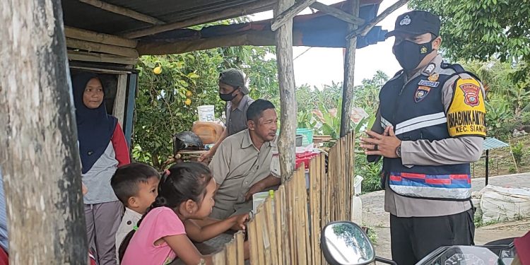 Bhabinkamtibmas Polres Anambas Melaksanakan Giat Optimalisasi Vaksinasi covid-19
