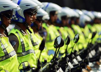 dedikasi anggota Polantas dalam menjaga lalu lintas tertib