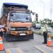 kepatuhan aturan dimensi dan kapasitas muatan kendaraan angkutan barang